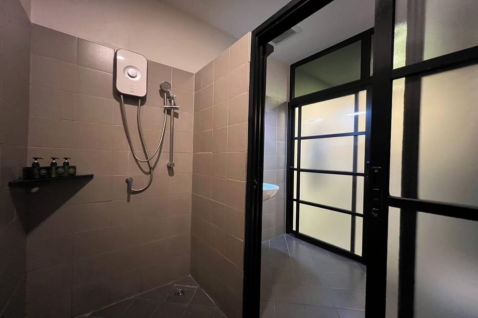 Shower, free toiletries, hair dryer, slippers