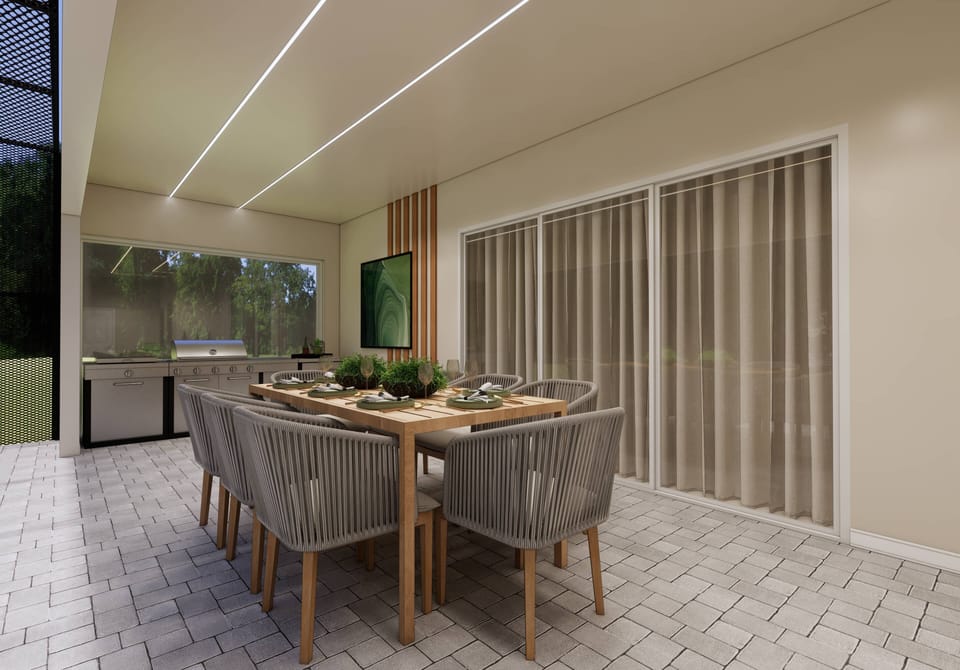 Gather around the stylish wooden dining table, adorned with natural textures and surrounded by chic woven chairs. Large glass doors invite abundant light and seamless access to the lush outdoors, enhancing your dining experience.