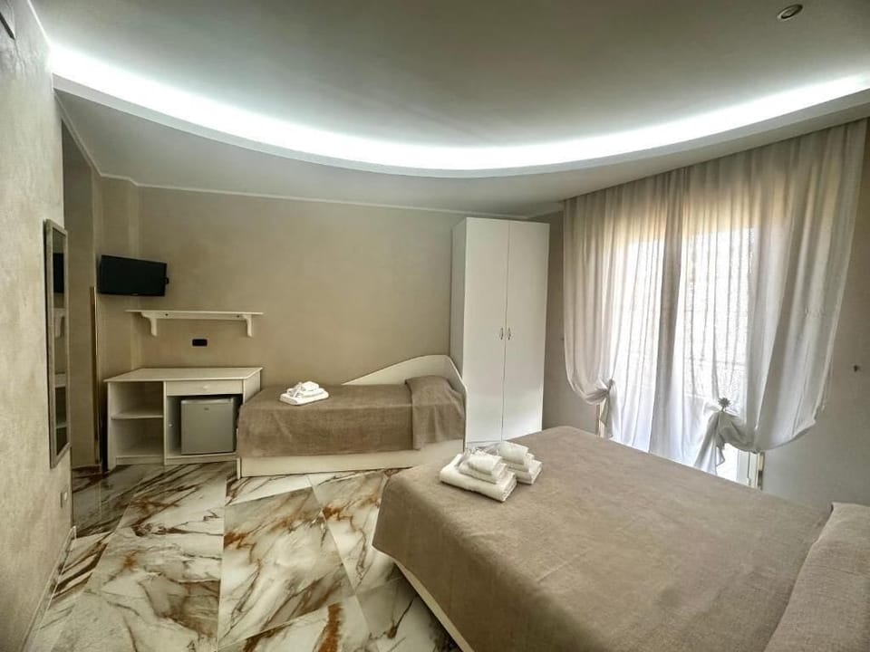 Deluxe Quadruple Room, Sea View | Laptop workspace, free WiFi