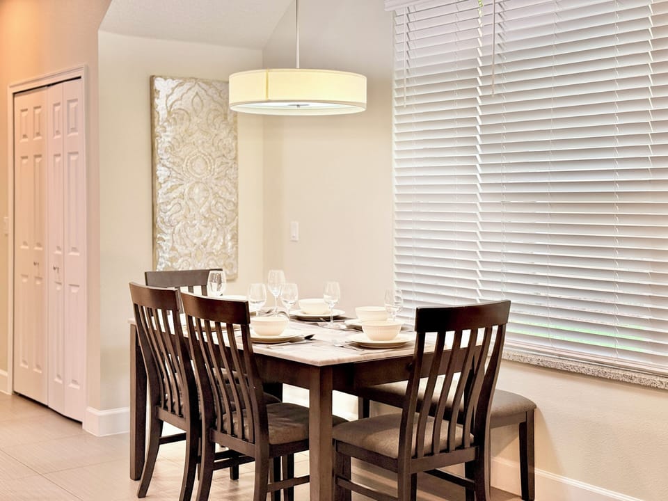 Elegant dining spot with warm lighting & cozy seating. Perfect for vacation meal