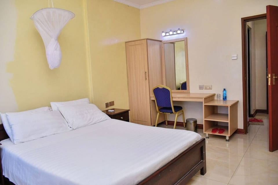Deluxe Room, Patio, Garden View | Desk, laptop workspace, free WiFi