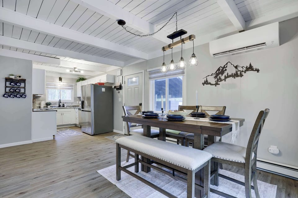 Experience the perfect blend of style and ease in this inviting dining and kitchen area, designed specifically to help you feel right at home from the moment you arrive.