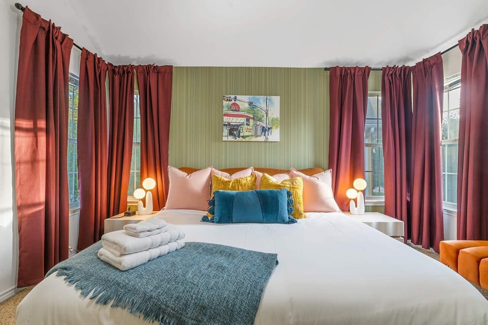 Luxury Awaits – The king-size bed in this room offers the perfect spot for relaxation, with plenty of space to stretch out and unwind.