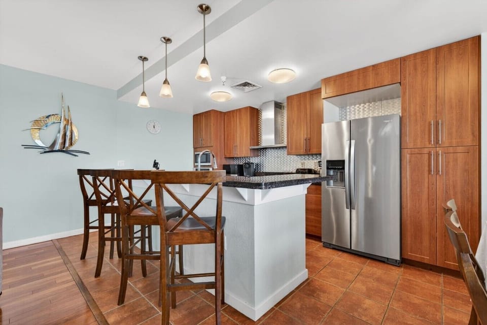 Gather around the table and enjoy spectacular sunrise scenery while planning another perfect day at the beach.