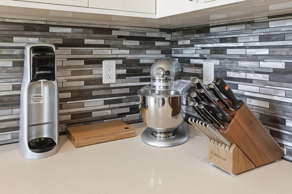Well-stocked modern kitchen with premium appliances and sleek finishes