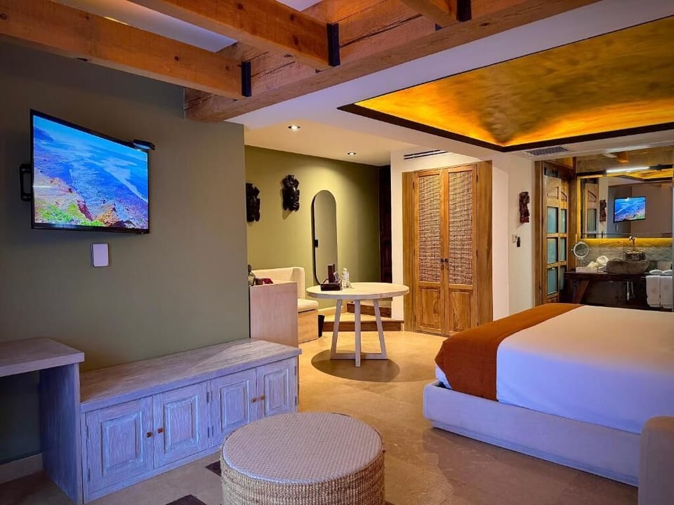 Deluxe Suite, Balcony, City View | In-room safe, individually decorated, iron/ironing board, free WiFi