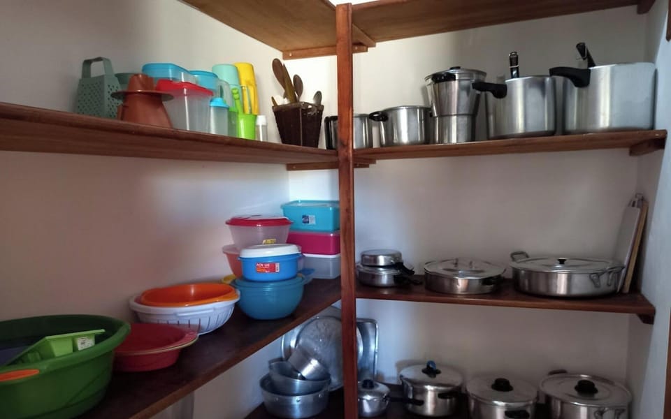 House | Private kitchen | Fridge, microwave, cookware/dishes/utensils, dining tables