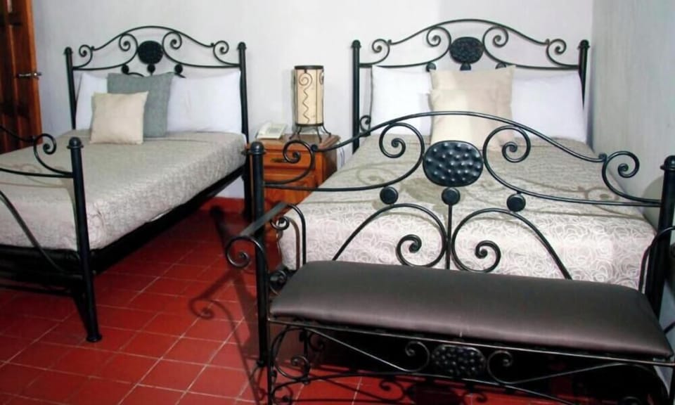 Double Room, 2 Queen Beds, Non Smoking, Air conditioning | In-room safe, iron/ironing board, free WiFi, bed sheets