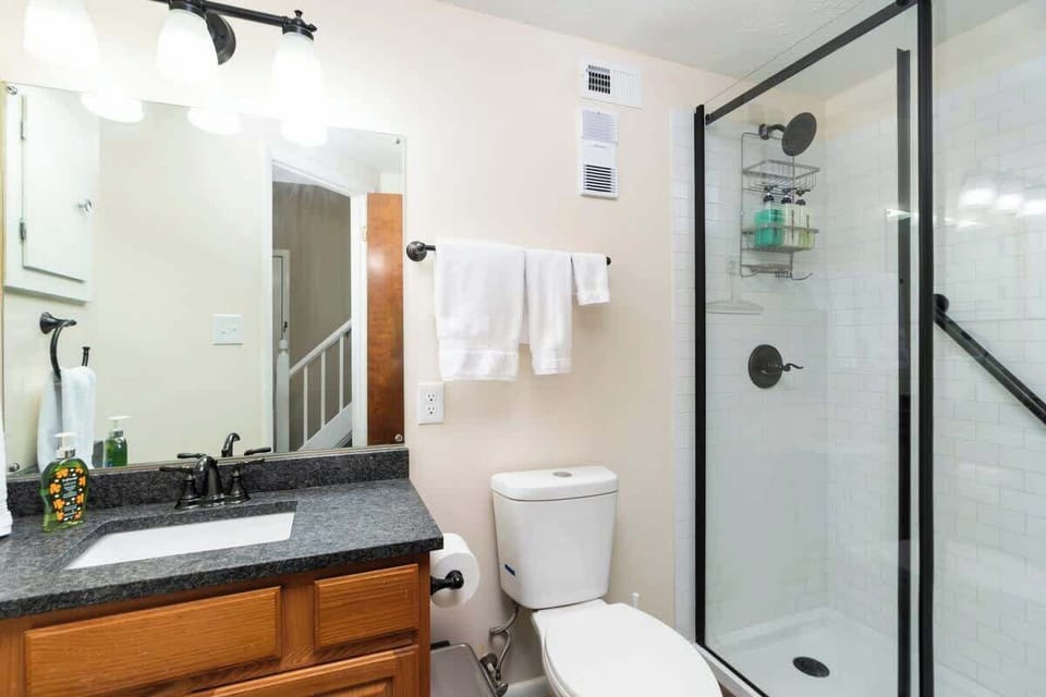 Main Level Full Bathroom attached to Bedroom 