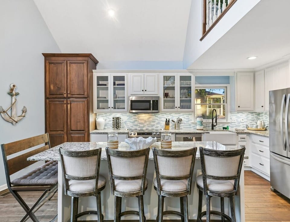 Well equipped kitchen with water views inside the home