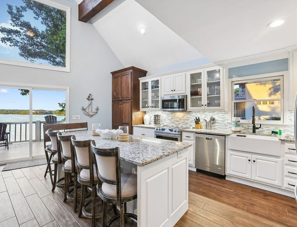 Well equipped kitchen with water views inside the home