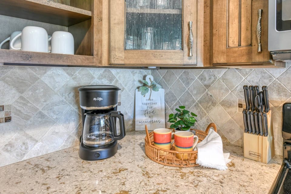 Make your morning coffee in the cozy kitchen.
