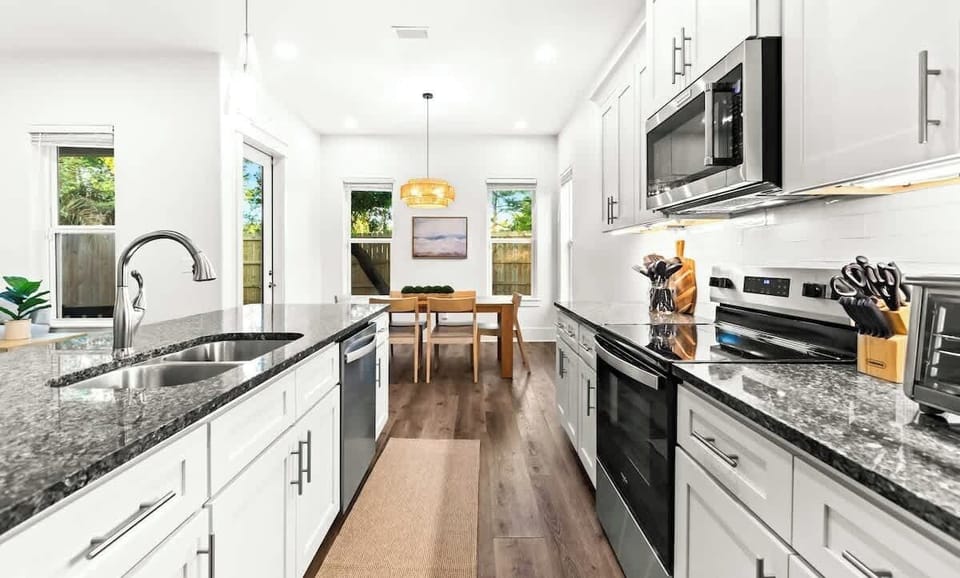 Kitchen: Drip coffee maker, Keurig, blender, toaster oven, Crockpot, tableware 
