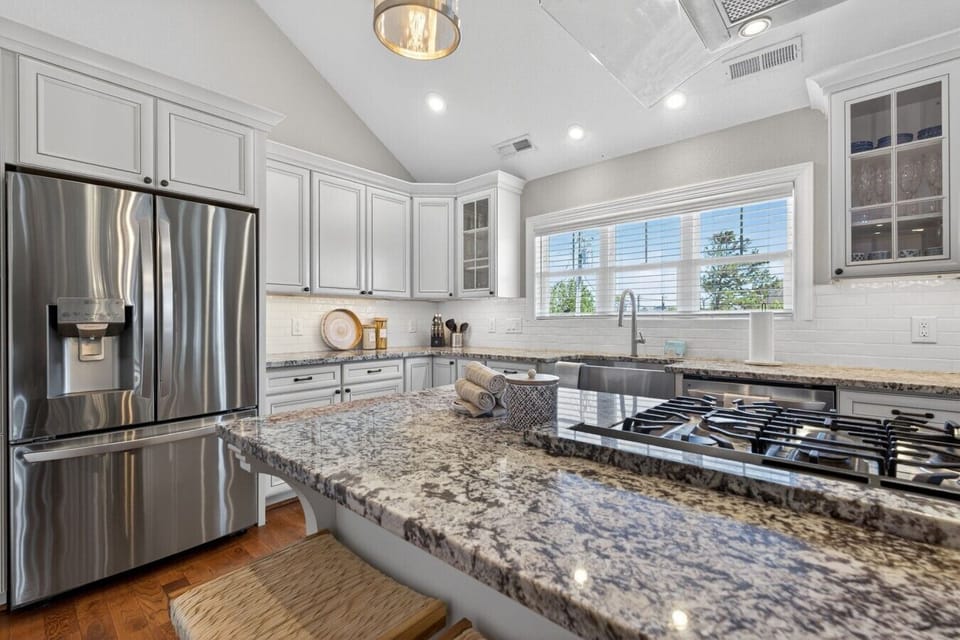 Granite countertops and stainless appliances make cooking a pleasure.