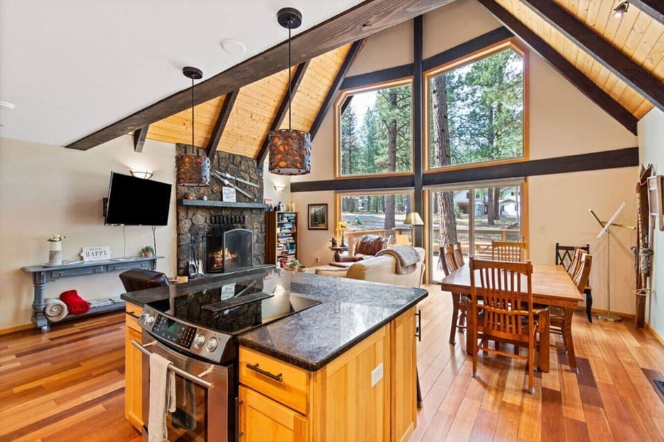 Open-concept kitchen and living area designed for gathering together.