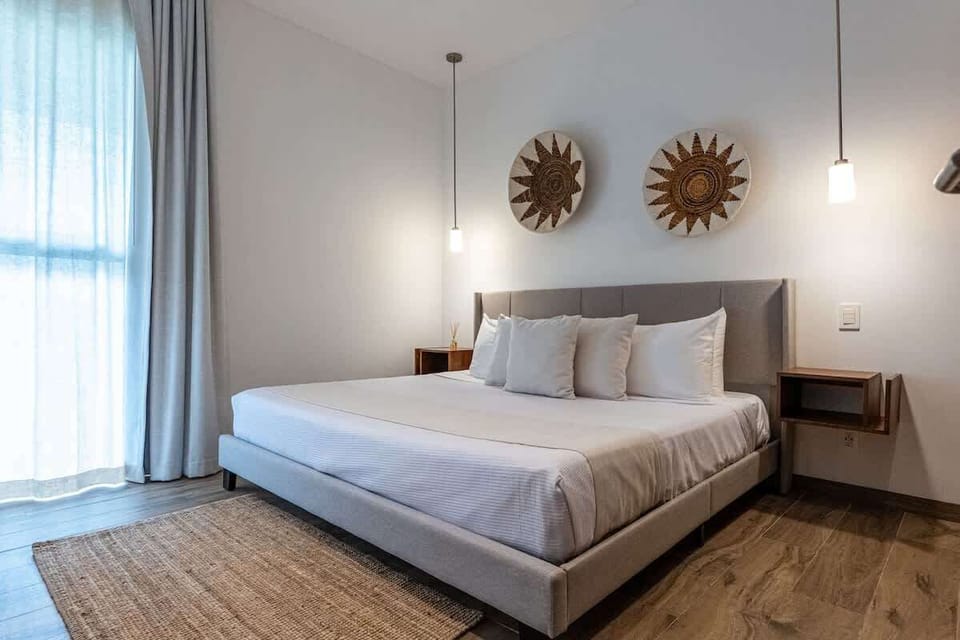 Second king bedroom with balcony access and A/C