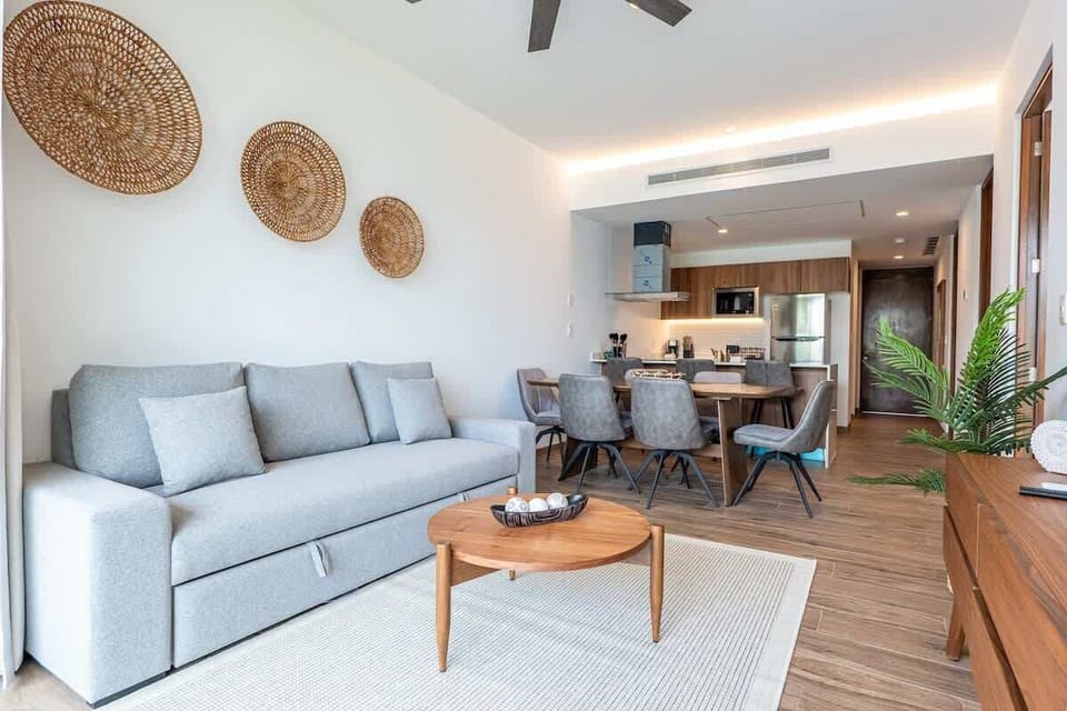 Open-plan living and dining area flowing into the kitchen