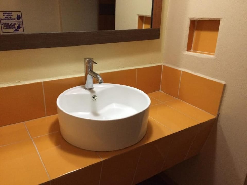 Quadruple Room, Courtyard View | Bathroom | Shower, soap, shampoo, toilet paper
