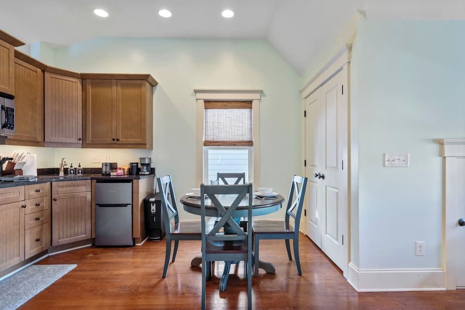 Open kitchen and dining nook — bright, functional, and fully stocked