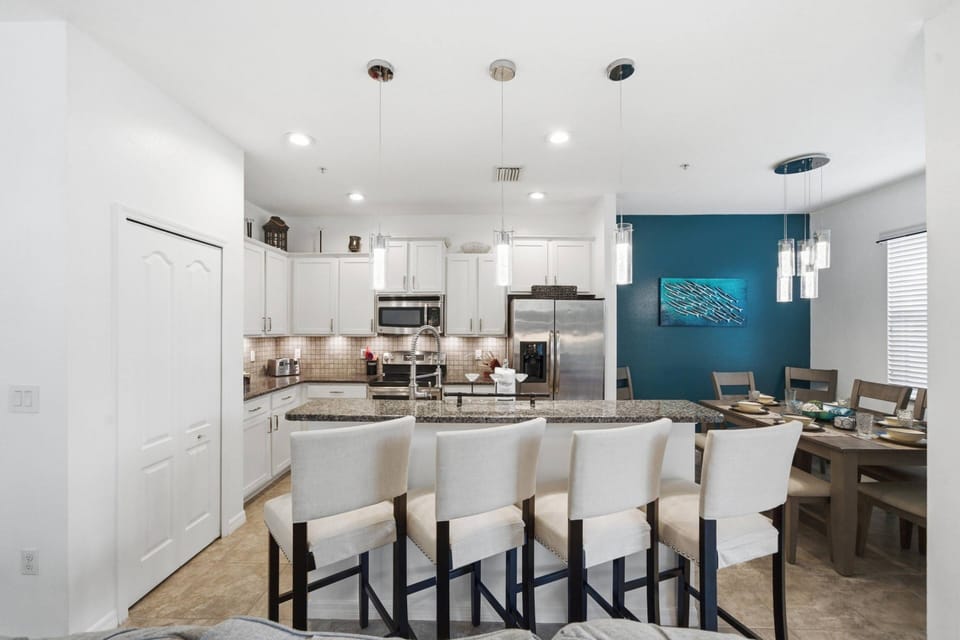 Spacious breakfast bar with seating for four