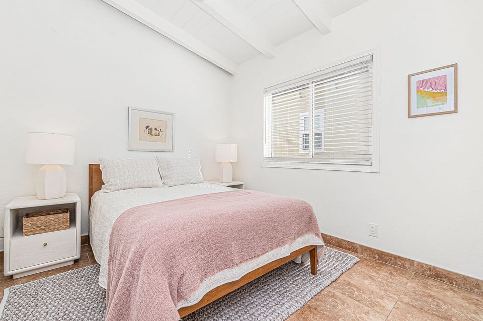 Guest Bedroom 3 with a full-size bed and comfortable coastal charm
                