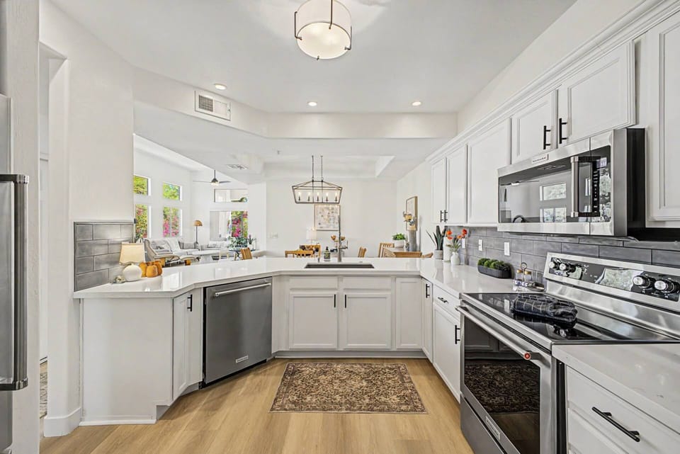 Great kitchen with traditional & Keurig Coffee maker, cookware & utensils, fridge, cooktop, microwave