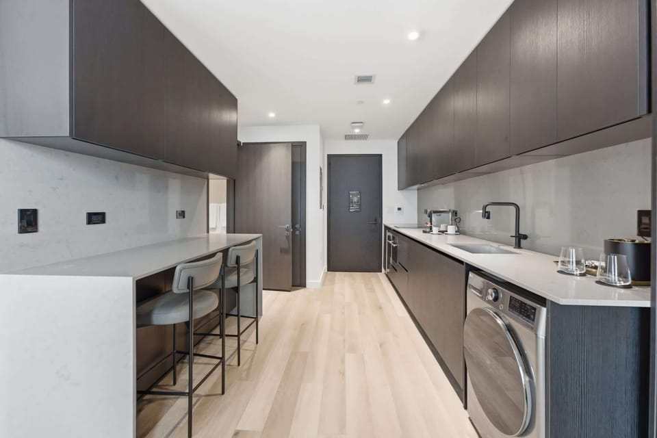 Gourmet kitchen with high-end integrated appliances.