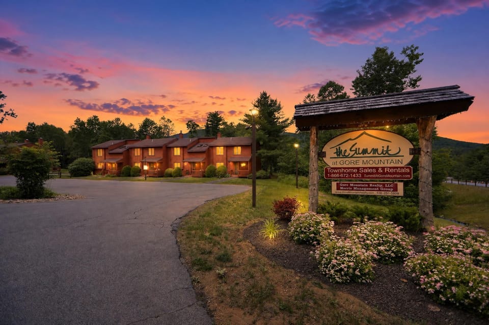Community entrance at sunset