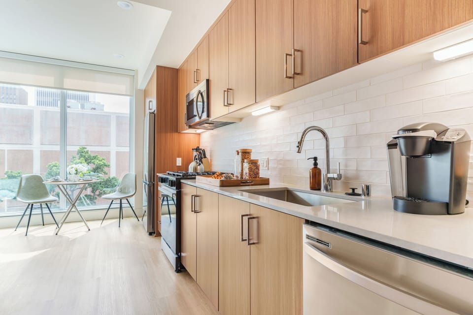 Unit 205: Studio with designer kitchen.