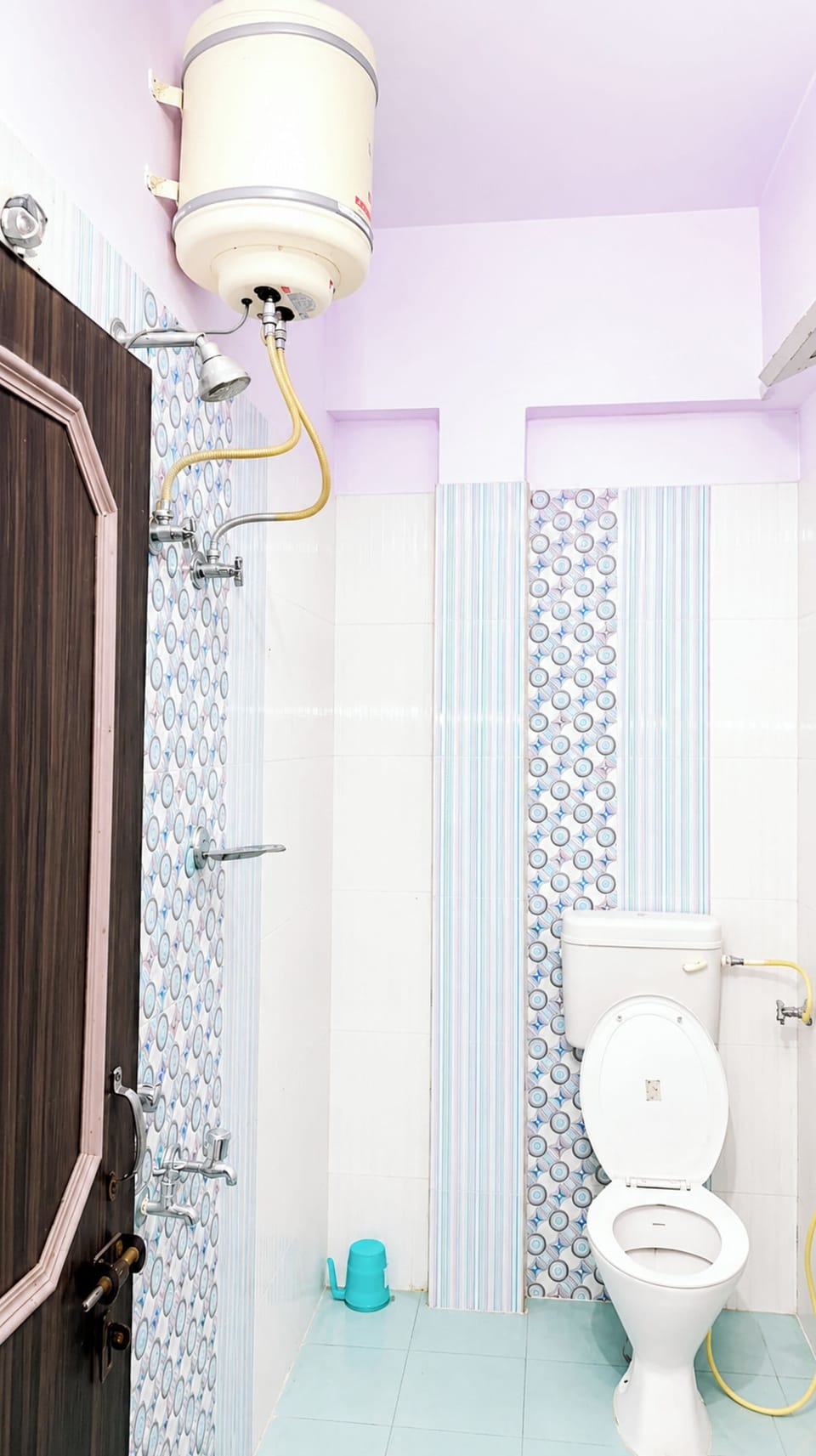 Shower, rainfall showerhead, slippers, towels