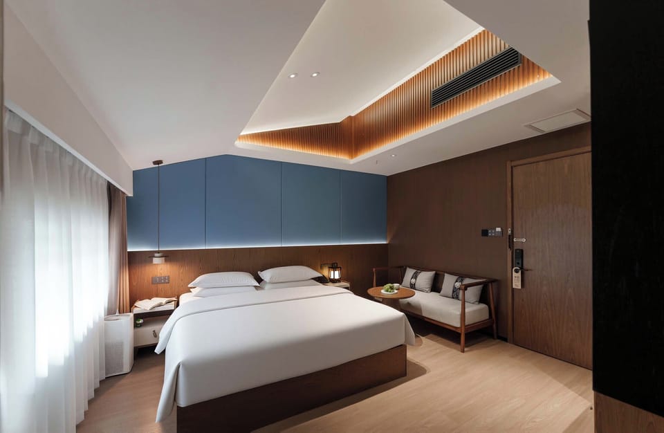 Elite Double Room | Premium bedding, minibar, desk, laptop workspace