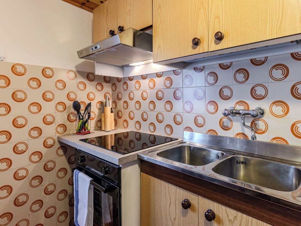 Furniture, Interior Design, Wall, Flooring, Wood, Floor, Room, Ceiling, Lighting, Home