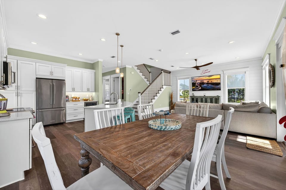 Dining area with seating for 4 at the island and 6 at the dining table