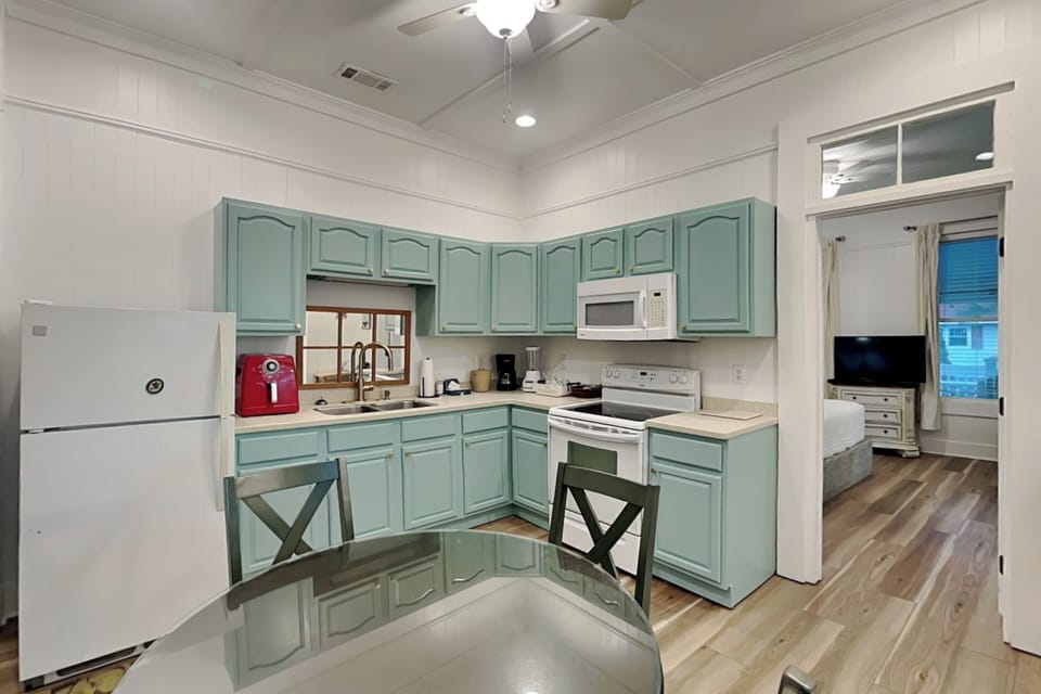 Fully Equipped Kitchen + Dining Table w/ Seating for Four