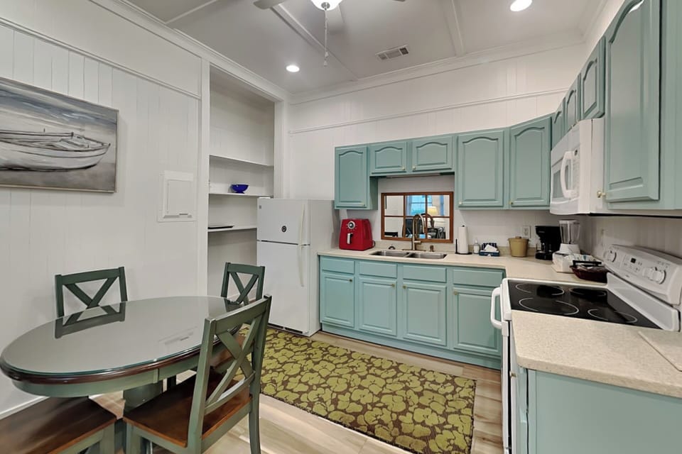 Fully Equipped Kitchen + Dining Table w/ Seating for Four