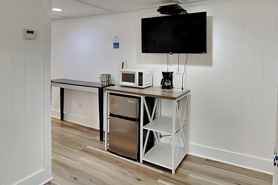 Kitchenette w/ Mini Fridge, Microwave + Coffee Maker