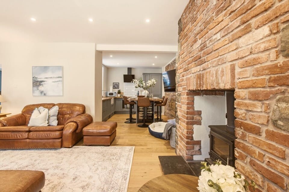 View from the fireplace towards the kitchen and dining area.