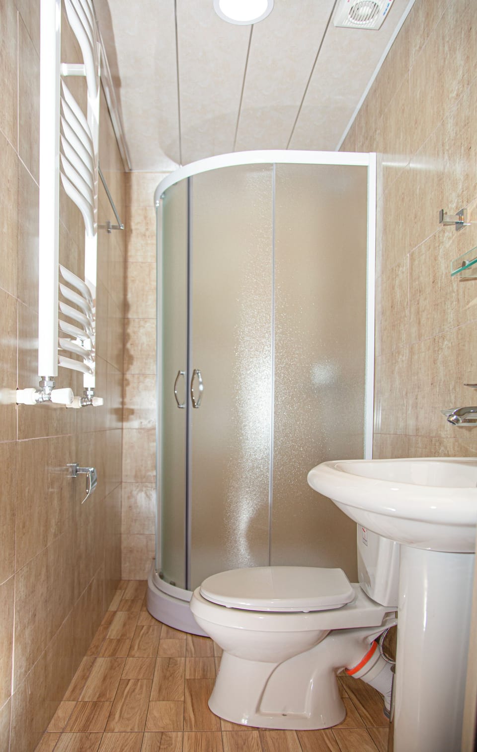 Shower, free toiletries, hair dryer, slippers