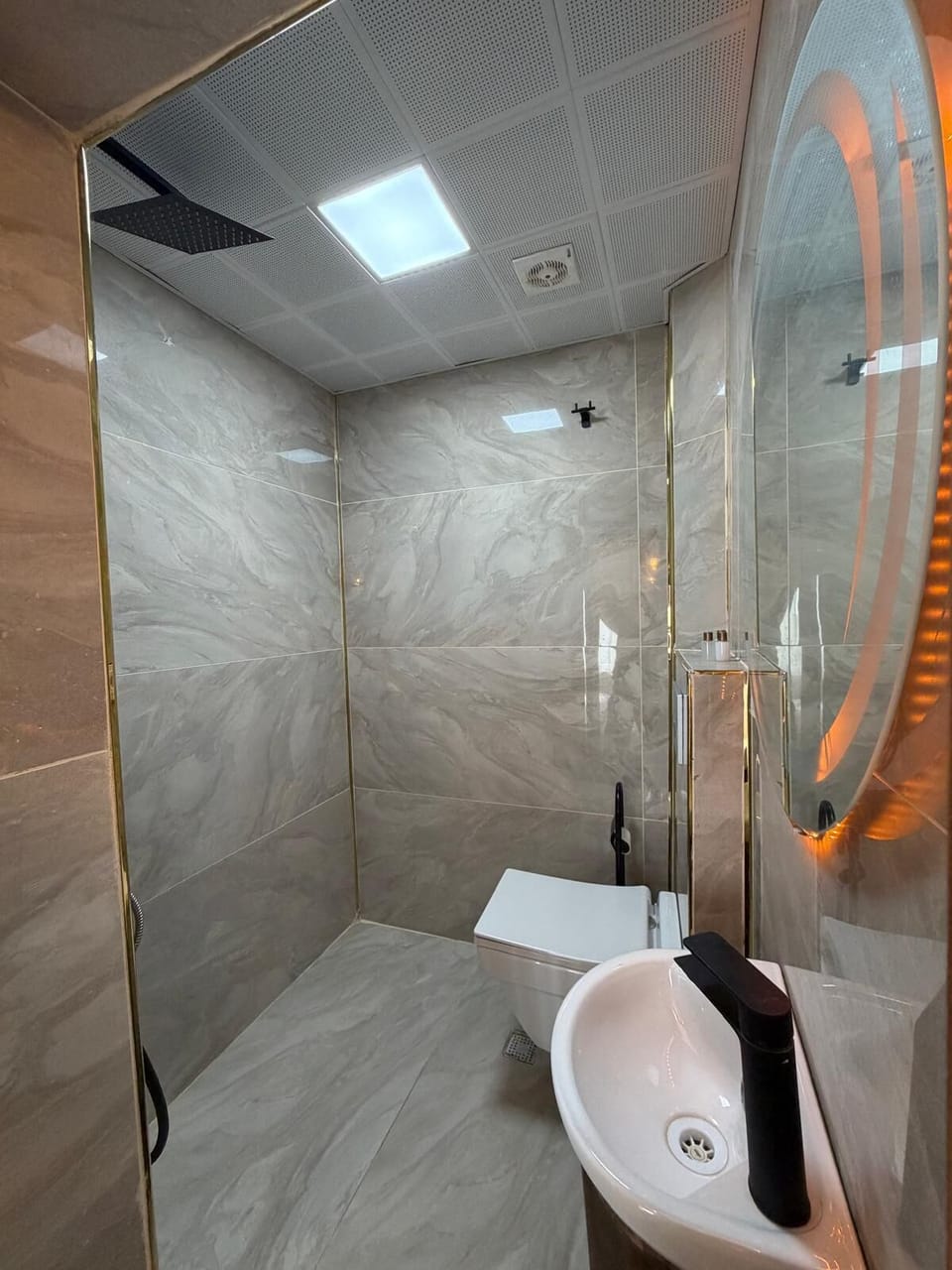 Hair dryer, towels, soap, shampoo