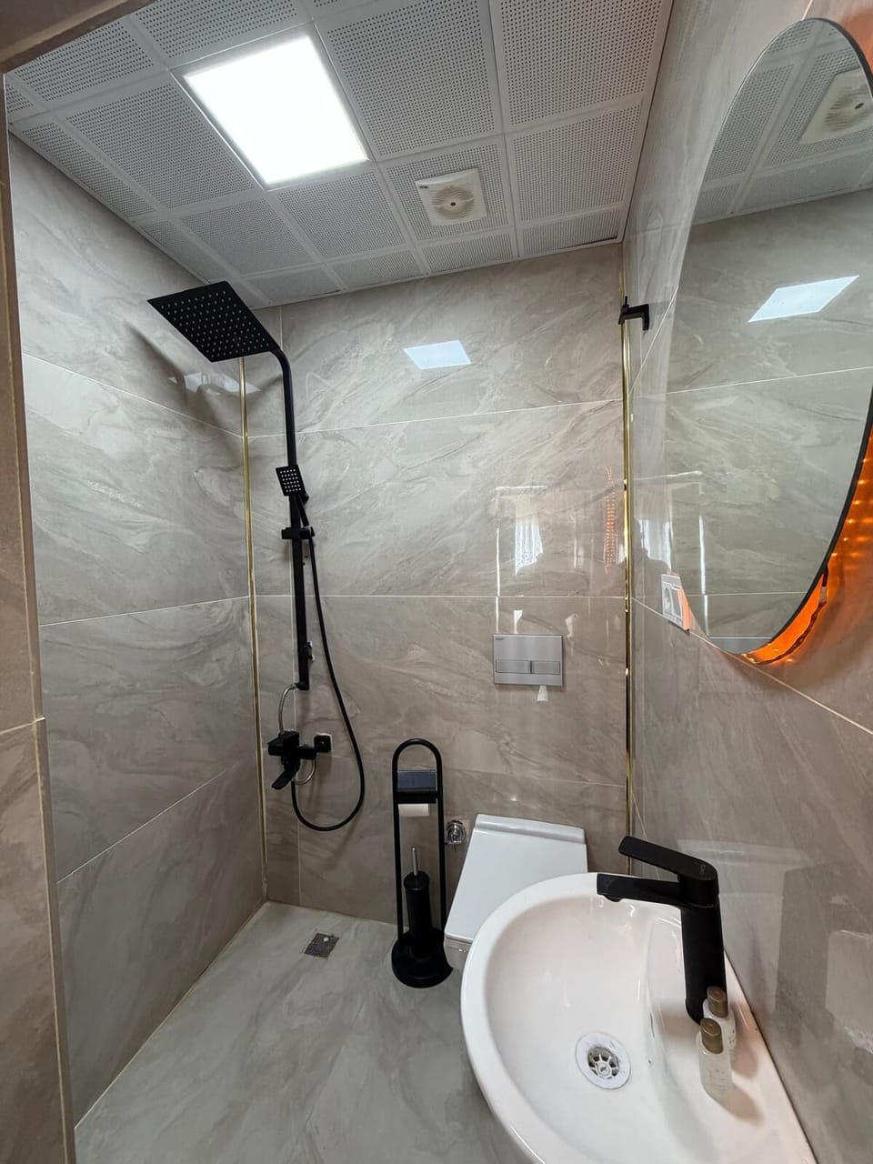 Hair dryer, towels, soap, shampoo
