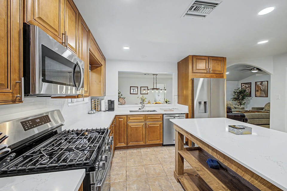 Spacious kitchen with island. All with quartz countertops.