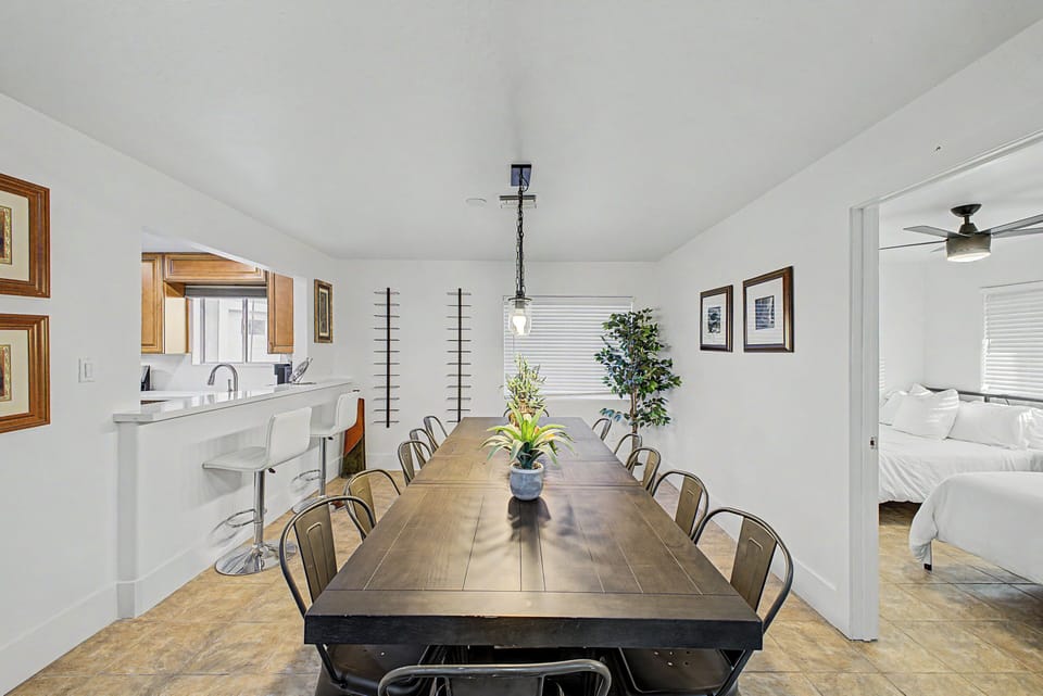 Dining area for 12 off the great room with pass through bar to the kitchen.. 