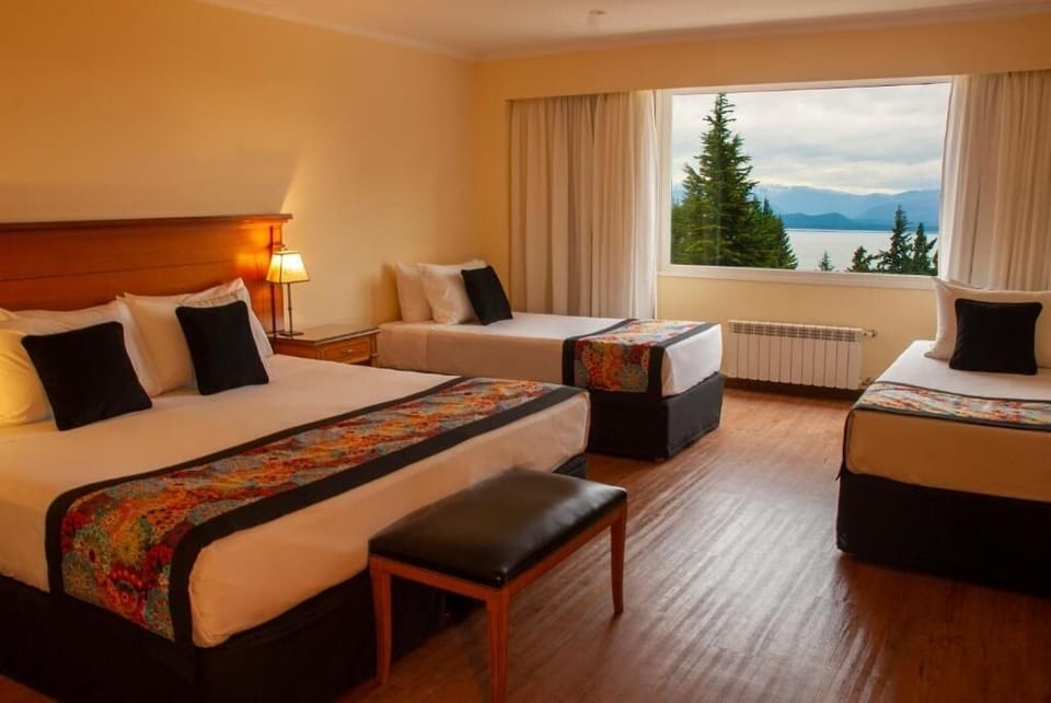 Stretch out and admire mountain-and-lake views from your room.