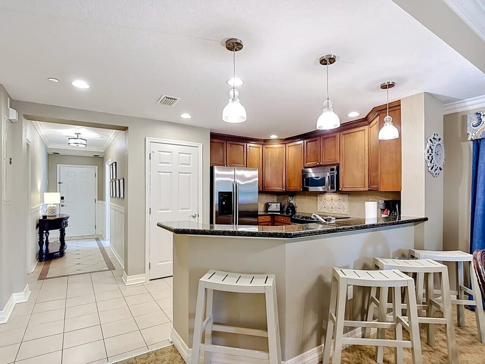 Open dining and kitchen area offering comfortable seating and a welcoming space for meals and gatherings.