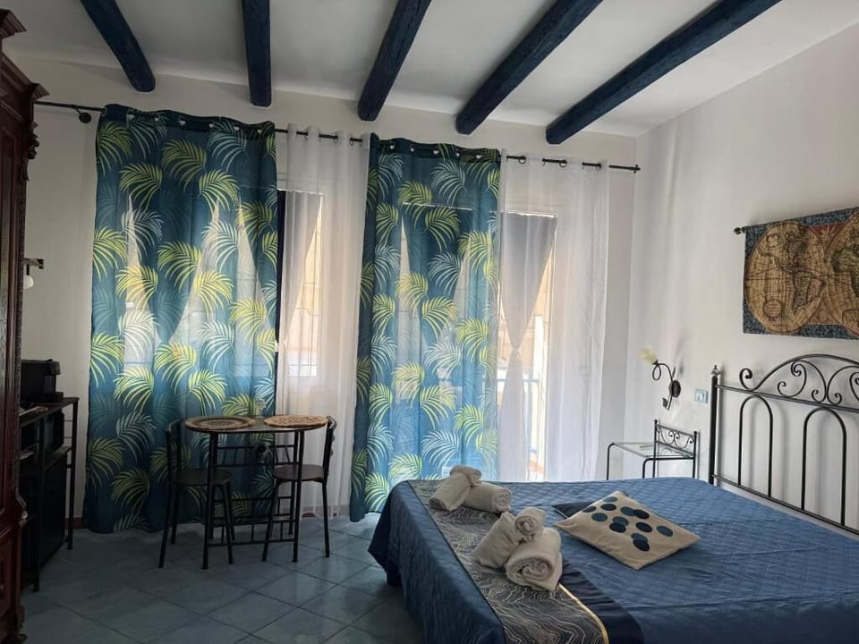 Comfort Room, Balcony | Desk, blackout drapes, iron/ironing board, free WiFi