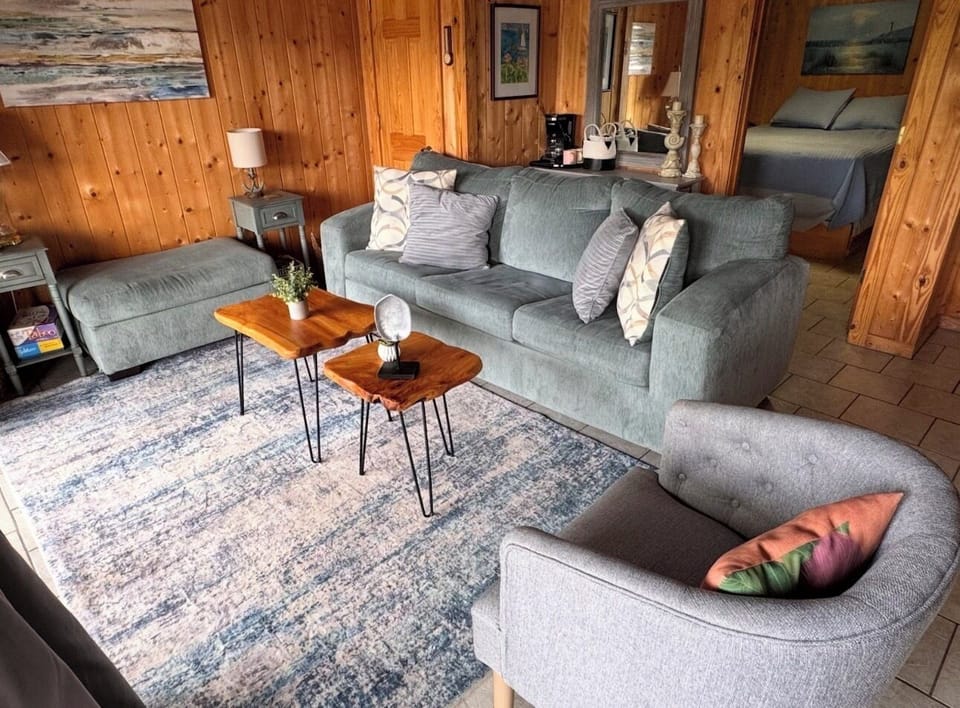 Family room with view of master bedroom in background