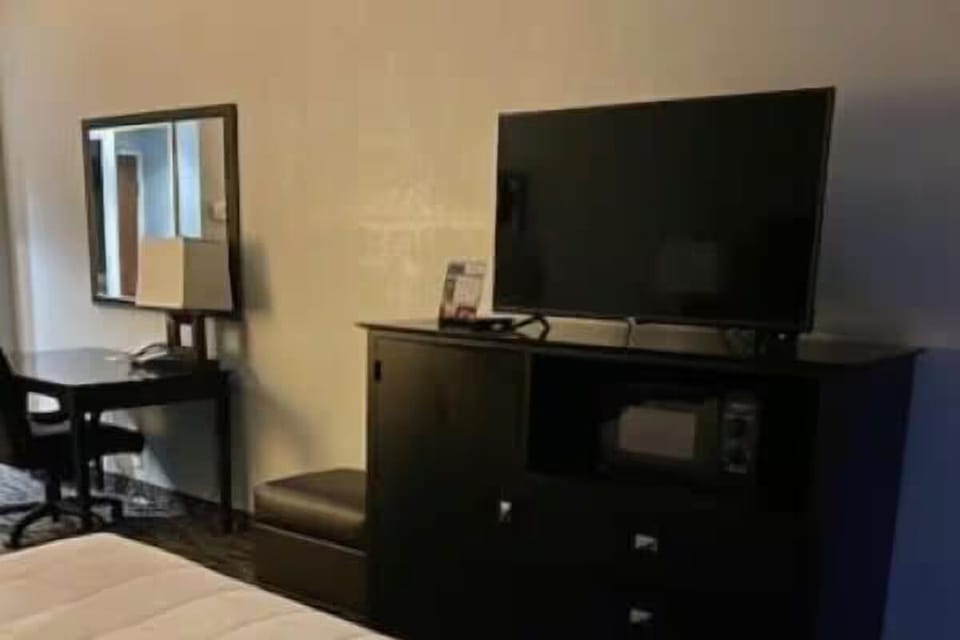 Settle in with a big TV and convenient work desk.