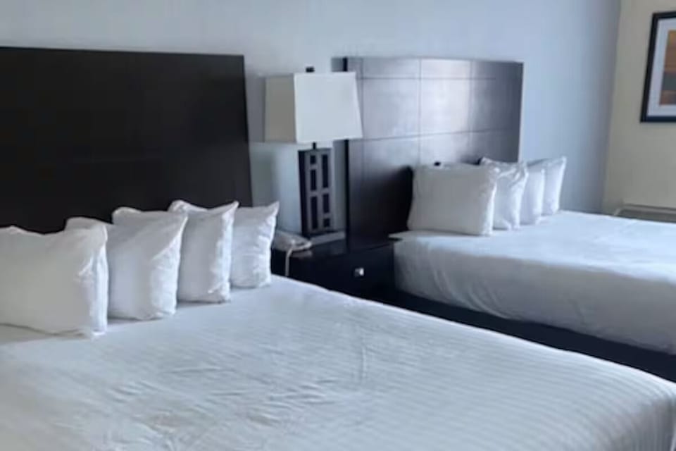 Relax together with two cozy beds and soft pillows.