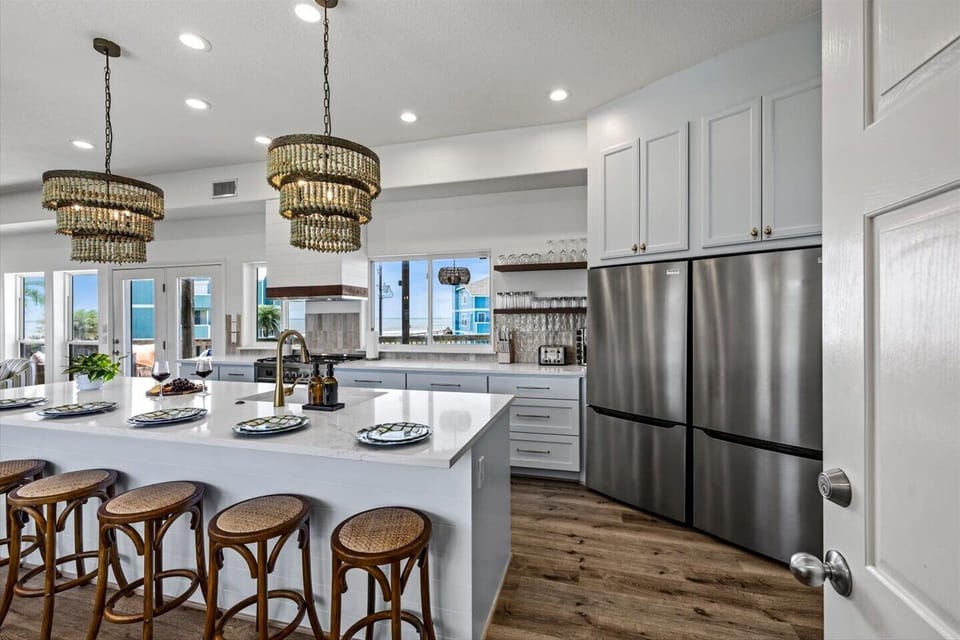 Double Fridges with double ice makers and a built in ice maker too! Plenty of room for all! 