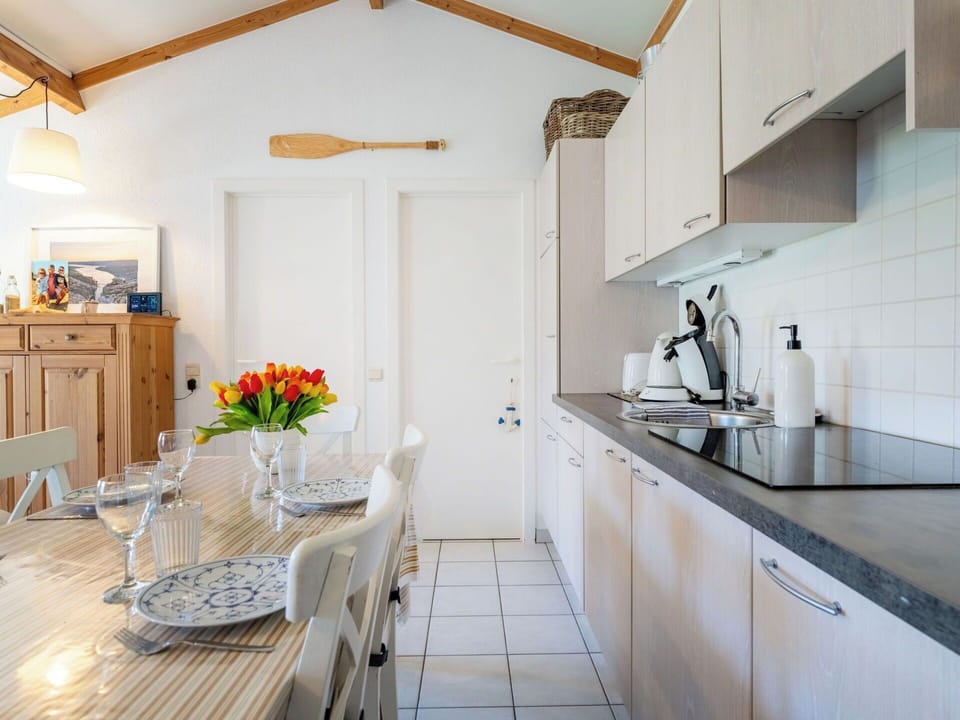 Furniture, Interior Design, Countertop, Kitchen, Wood, Flooring, Ceiling, Room, Kitchen Appliance, Cabinetry